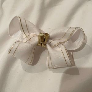 Gold and white designer bow